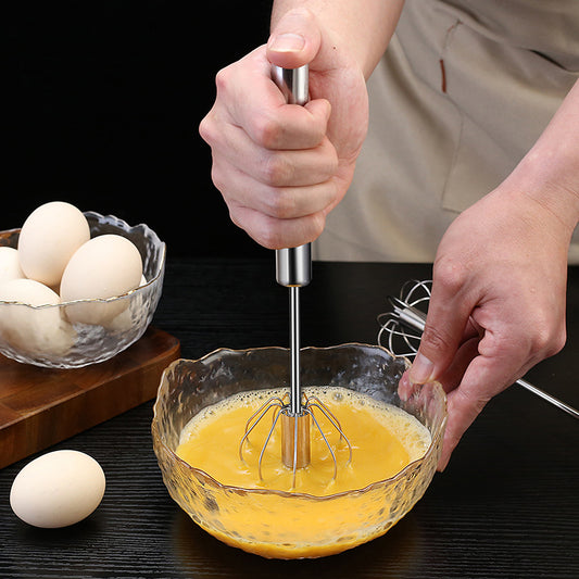 Stainless Steel Semi-automatic Egg Beater in use